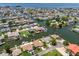 Beautiful aerial view showcasing waterfront living on canals leading to the ocean at 13811 Michelle Ave, Hudson, FL 34667