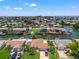 Aerial view of the neighborhood with waterfront canal homes, a short distance to the ocean at 13811 Michelle Ave, Hudson, FL 34667