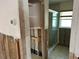 Bathroom featuring a glass-enclosed shower at 13811 Michelle Ave, Hudson, FL 34667