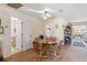 Cozy dining area adjacent to kitchen, bedroom, and bathroom at 13811 Michelle Ave, Hudson, FL 34667