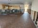 Open-concept kitchen with warm toned cabinets and natural light at 13811 Michelle Ave, Hudson, FL 34667