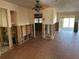 Open-concept living area with partially exposed framing, ready for renovation and customization at 13811 Michelle Ave, Hudson, FL 34667