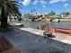 Enjoy waterfront living in this home with dock, boat lift, seawall, and canal views at 13811 Michelle Ave, Hudson, FL 34667
