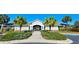 Community center featuring mature landscaping, a walkway and covered entryway at 14581 Wake Robin Dr, Brooksville, FL 34604