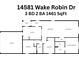 Home floor plan featuring 3 bedrooms, 2 baths, kitchen, living room and a 2-car garage at 14581 Wake Robin Dr, Brooksville, FL 34604
