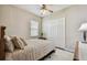 Inviting bedroom with a queen-sized bed, a plush rug, and a closet with sliding doors at 15912 42Nd E Gln, Parrish, FL 34219
