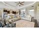 Open concept living area featuring a modern kitchen, a dining space, and a living room area at 15912 42Nd E Gln, Parrish, FL 34219