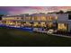 Elegant modern home with a long pool, spacious outdoor living areas, and manicured grounds, perfect for luxurious living at 18725 Jiretz Rd, Odessa, FL 33556