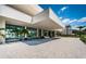 Stunning modern home featuring a grand entrance with water feature and meticulously landscaped grounds at 18725 Jiretz Rd, Odessa, FL 33556