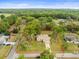 Expansive aerial shot showcasing the property's boundaries, lush greenery, and surrounding landscape at 24104 Peppermill Dr, Brooksville, FL 34601