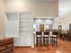 Open-concept room with bar seating and a view of the Gathering and dining rooms at 24104 Peppermill Dr, Brooksville, FL 34601