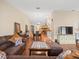 An open floor plan seamlessly integrates the living room, dining area, and kitchen at 24104 Peppermill Dr, Brooksville, FL 34601