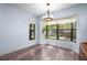 Dining room with large bay window offering natural light and scenic views at 28330 Peterson Camp Rd, Brooksville, FL 34601