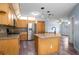 Kitchen showcasing island with seating, stainless steel appliances, and abundant cabinetry at 28330 Peterson Camp Rd, Brooksville, FL 34601