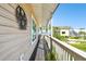 Relaxing covered porch with a view of the water and lush greenery at 3009 7Th Avenue E Cir, Bradenton, FL 34208