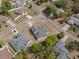 Bird's eye view of a residential neighborhood, highlighting a charming home at 3017 Aldoro Ave, Spring Hill, FL 34609