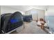 Bedroom with carpet flooring, high ceilings, and window at 3017 Aldoro Ave, Spring Hill, FL 34609
