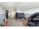 Bedroom featuring carpet floors and access to the bathroom at 3017 Aldoro Ave, Spring Hill, FL 34609