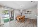 Bright dining room with sliding glass doors to the outdoor patio at 3017 Aldoro Ave, Spring Hill, FL 34609