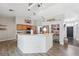 View of the kitchen featuring an island with updated cabinets and plenty of counter space at 3017 Aldoro Ave, Spring Hill, FL 34609
