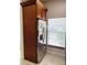 Kitchen featuring a stainless steel refrigerator and a bright window at 3037 Leroy W St, Tampa, FL 33607