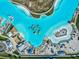 Birds-eye view of the turquoise lagoon featuring an inflatable obstacle course at 30839 Penny Surf Loop, Wesley Chapel, FL 33545