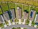 A birds-eye view shows the property's boundaries with lush landscaping and a private driveway at 30839 Penny Surf Loop, Wesley Chapel, FL 33545