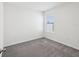 Cozy bedroom with neutral carpet, a window, and ample natural light at 30839 Penny Surf Loop, Wesley Chapel, FL 33545