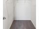 Walk-in closet with a minimalist design and carpet at 30839 Penny Surf Loop, Wesley Chapel, FL 33545