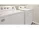 Close up of white Whirlpool washer and dryer with visible settings at 4004 Autumn Amber Dr, Spring Hill, FL 34609