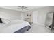 Bright bedroom with neutral tones, a comfortable bed, and ample closet space at 4012 Dragonfly Trl, Odessa, FL 33556