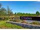 Starkey Ranch community entrance sign featuring lush greenery and landscaping at 4012 Dragonfly Trl, Odessa, FL 33556