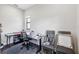 Functional office features a sewing station, desk space, and natural light, designed for productivity and creativity at 4012 Dragonfly Trl, Odessa, FL 33556
