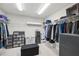 Spacious walk-in closet with ample storage, shelving, and room for organization at 4012 Dragonfly Trl, Odessa, FL 33556