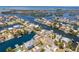 An aerial view displays the vast canal system running through a waterfront community at 4503 Jacona Dr, Hernando Beach, FL 34607