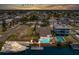 Backyard pool and dock on canal provides waterfront living at 4503 Jacona Dr, Hernando Beach, FL 34607