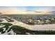 Expansive aerial view showcasing homes on waterfront property and canals in a charming coastal community at 4503 Jacona Dr, Hernando Beach, FL 34607