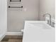 Bathroom vanity with white quartz countertop and updated faucet fixtures at 4503 Jacona Dr, Hernando Beach, FL 34607