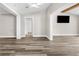 Open living space featuring new flooring and plenty of natural light at 4503 Jacona Dr, Hernando Beach, FL 34607