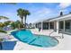 Beautiful backyard pool and spa with screened-in lanai and waterfront views at 4503 Jacona Dr, Hernando Beach, FL 34607