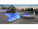 Inviting pool and jacuzzi offer serene views, creating the perfect backyard oasis for relaxation and enjoyment at 4503 Jacona Dr, Hernando Beach, FL 34607