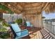 Relaxing tiki hut with comfortable seating, offering beautiful waterfront views from a private dock at 4503 Jacona Dr, Hernando Beach, FL 34607