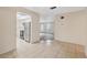 Bright kitchen with appliances, tile flooring, and ample natural light at 4559 Crescent Rd, Spring Hill, FL 34606