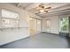 Enclosed porch with sliding doors and windows allowing ample light into the space at 4559 Crescent Rd, Spring Hill, FL 34606