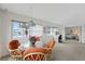 Dining area featuring a glass top table and a beautiful water view at 4632 Marine Pkwy # 201, New Port Richey, FL 34652