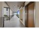 Hallway view of building with elevator access on the second floor at 4632 Marine Pkwy # 201, New Port Richey, FL 34652