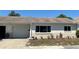 Charming single-story home features a well-maintained front yard, attached garage, and a neutral stucco exterior at 4653 Cambridge Ave # 4653, New Port Richey, FL 34652