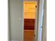 An organized closet with cedar planking at the back and wire shelving above at 5335 Embassy Ave # 5335, New Port Richey, FL 34652