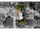 Aerial view of the property, showcasing the layout and surrounding greenery and the property's boundaries at 5342 Leisure St, Dade City, FL 33523