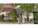 An aerial view of the property showing the pool, driveway, and surrounding neighborhood at 5417 Carlton Rd, New Port Richey, FL 34652
